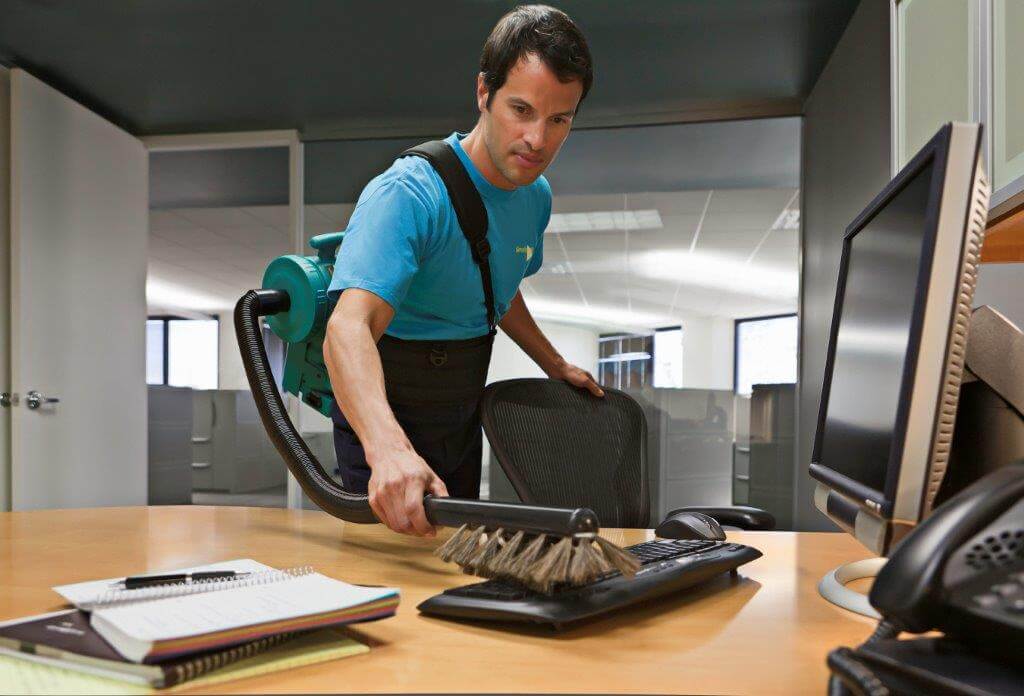 ServiceMaster Clean technician completing office cleaning service