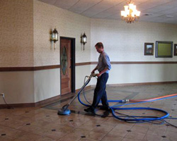 Man cleaning the floors