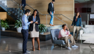Groups of business professionals in a lobby