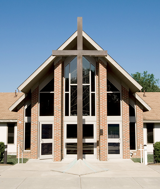 man typing on tablet