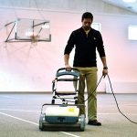 Man cleaning carpet