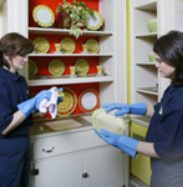 two women wiping dishes