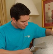 cleaner performing an upholstery cleaning