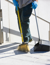 person sweeping floor